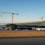 AI-generated editorial concept of a major modernization at Washington Dulles International Airport in Northern Virginia; final design may differ