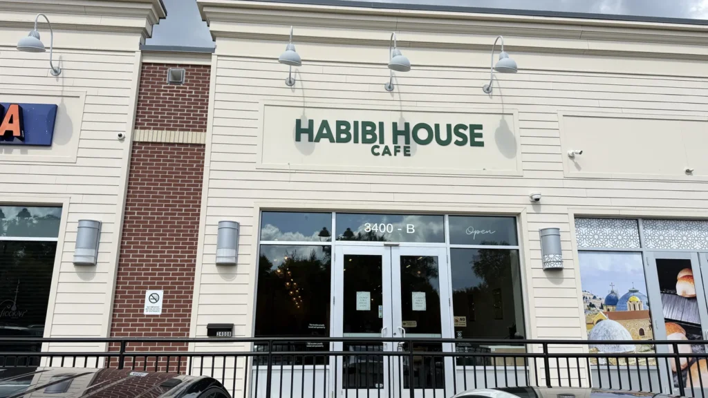 Habibi House Cafe storefront at 3400-B Washington Drive in Falls Church, with green lettering on a cream facade