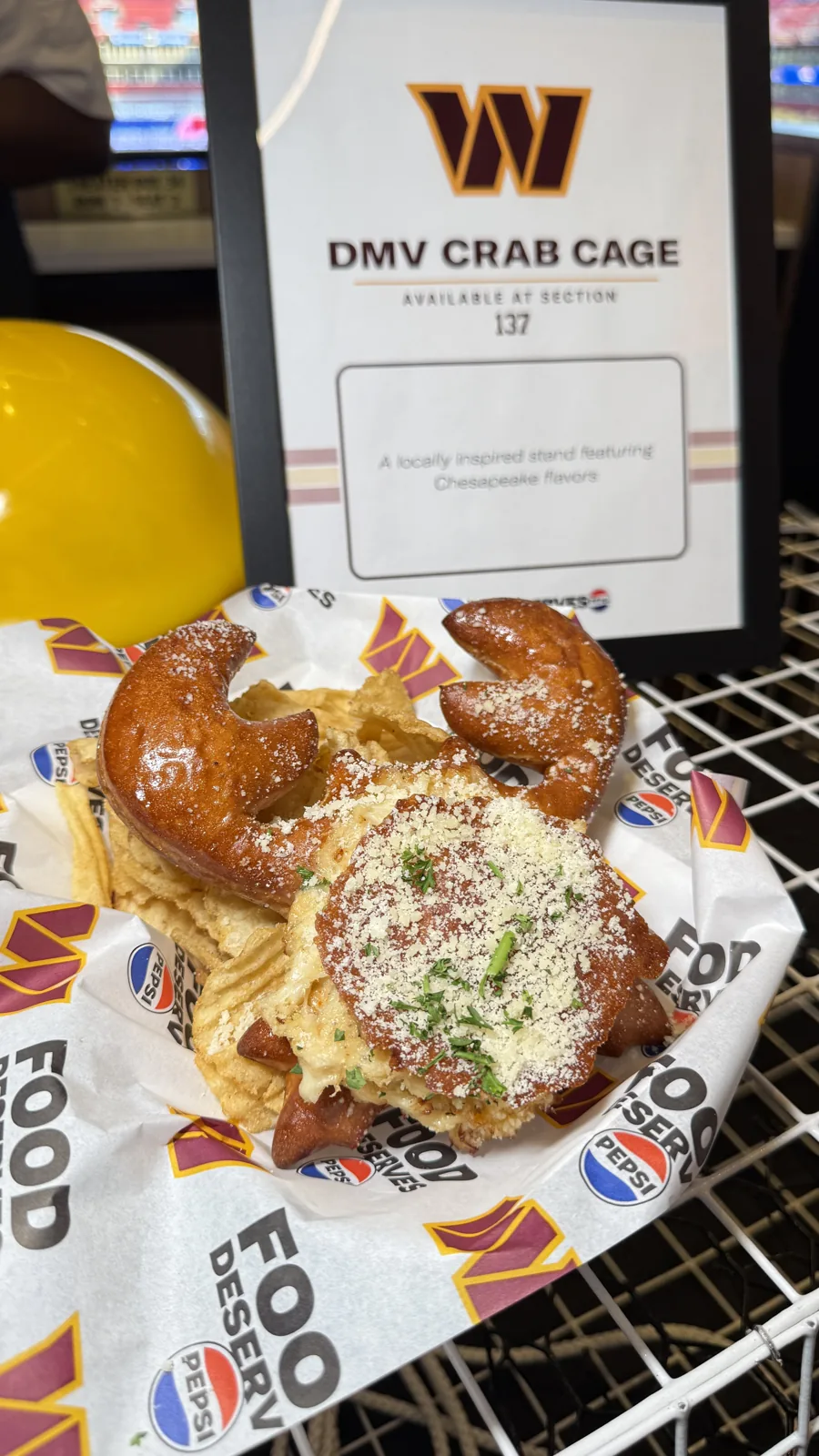 Crab-shaped stuffed pretzel with cheese and chips at DMV Crab Cage, section 137