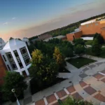Aerial view of the Johnson Center and the brick plaza on George Mason University’s Fairfax campus at dawn