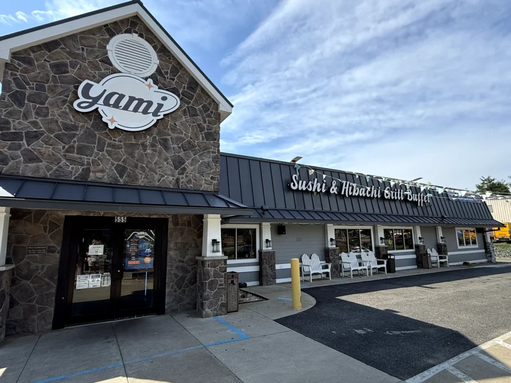 Yami Buffet’s stone-fronted building on South Van Dorn Street in Alexandria, the former Red Lobster, with the round Yami sign over the gable